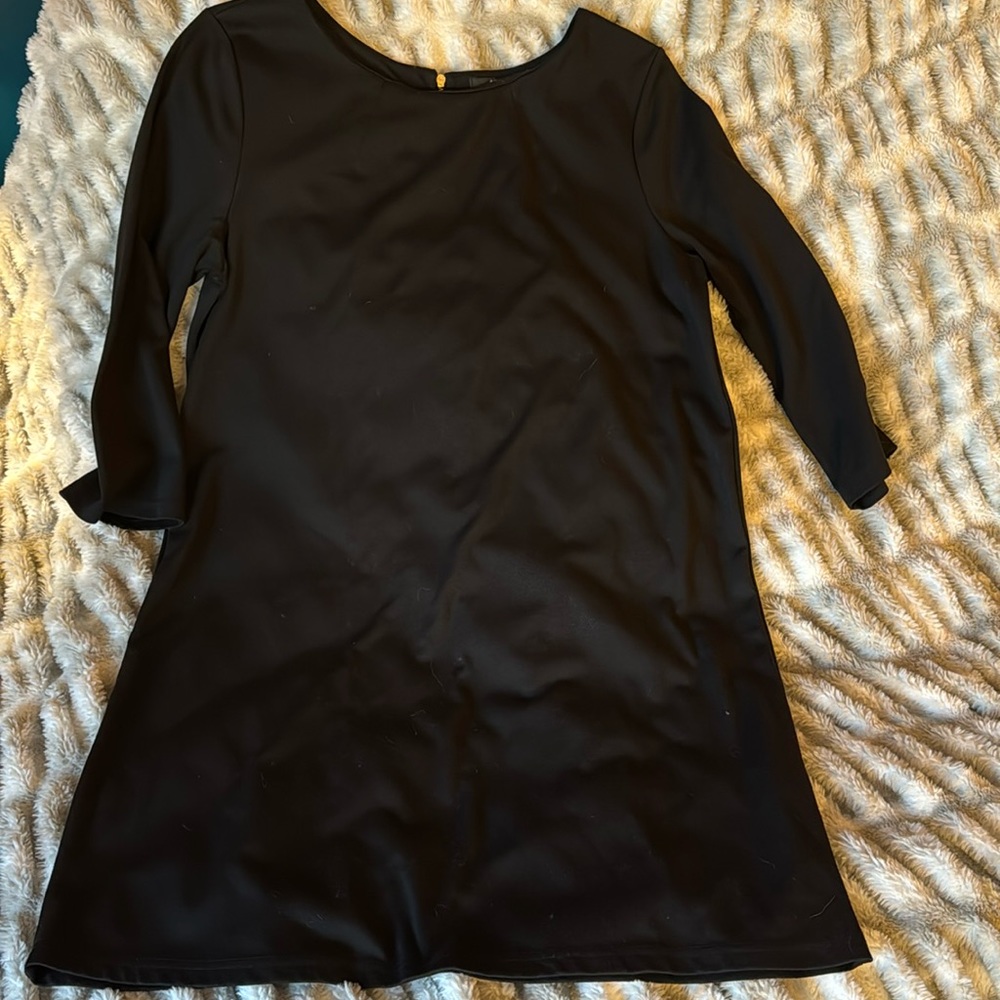 Black h&m short dress with gold zipper in back. Size large.